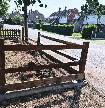 Old broken timber fence on a front boundary before replacement